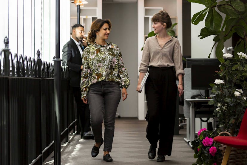 Hybrid workplace two women walking