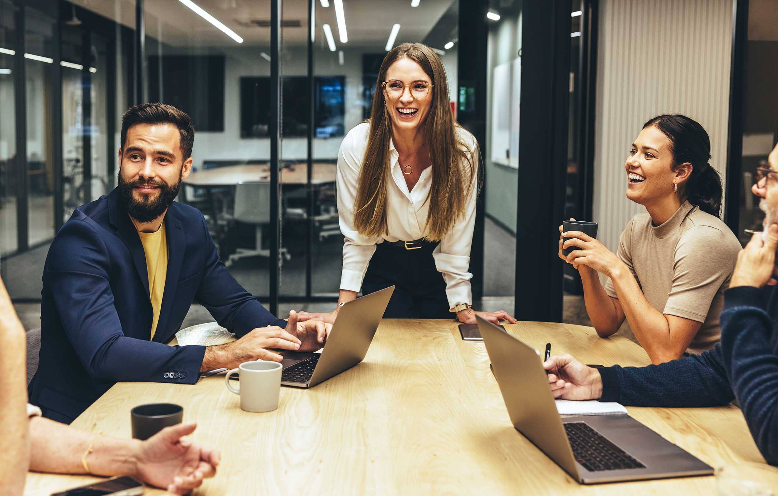 colleagues in a meeting working at a hybrid office